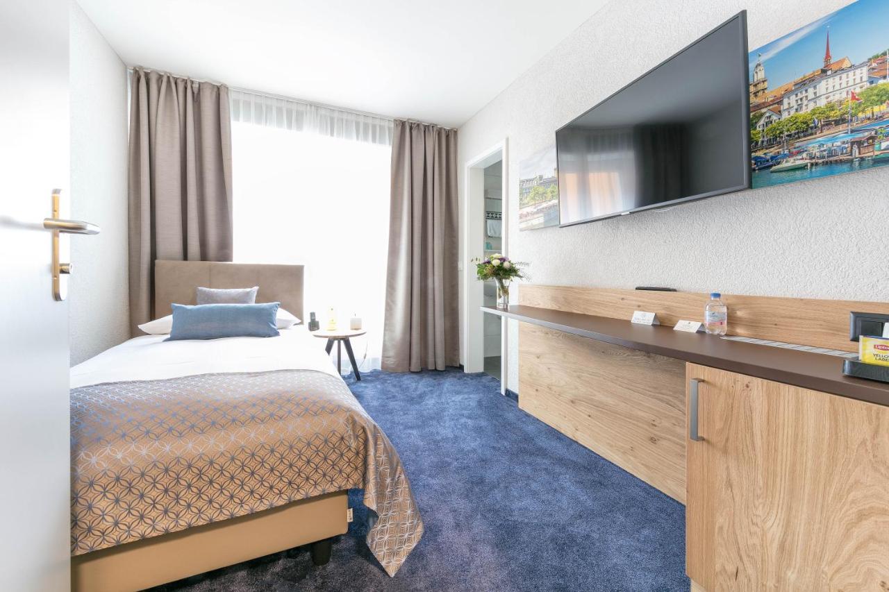 Hotel Tivoli Schlieren Bagian luar foto