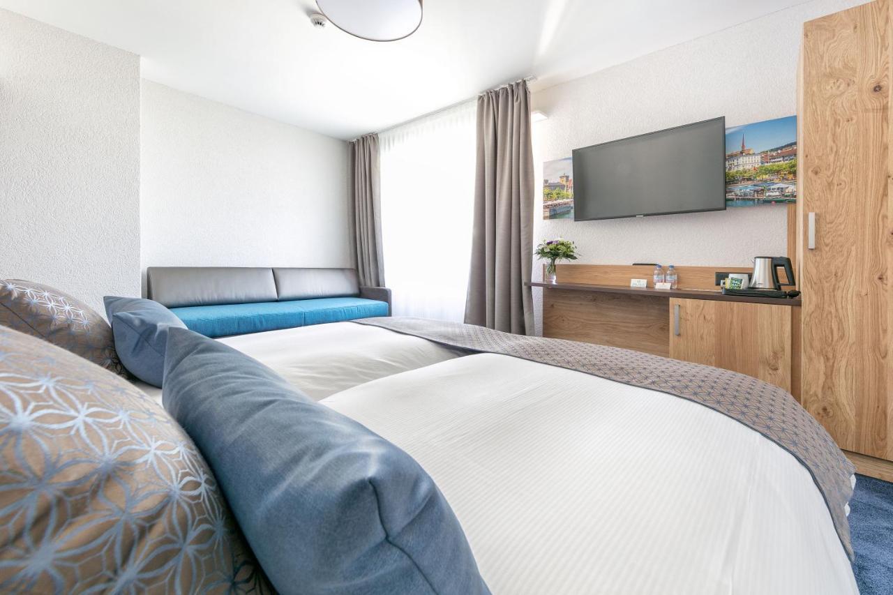 Hotel Tivoli Schlieren Bagian luar foto